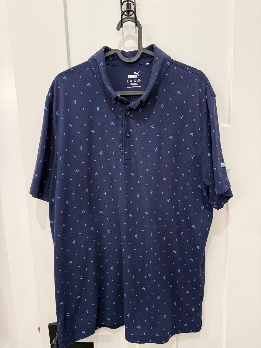 Puma Men’s Navy Polo with Light Blue Micro P Logo Pattern
